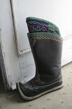 Boot with fancy embroidered tops