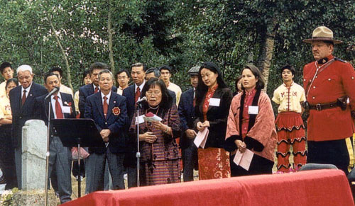 Lily Chow, Chair of the Prince George Chinese Heritage Preservation Committee, delivering the dedication speech on 4 August 2002. 
